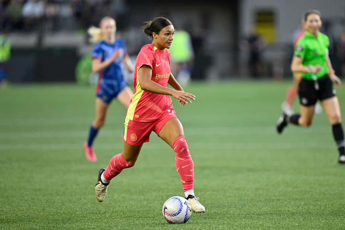 Vrouwelijke Voetballer In Actie Op Het Veld Achtergrond