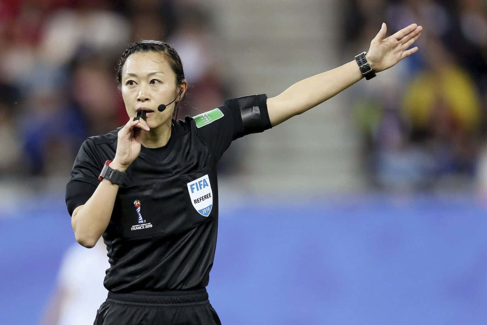 Female Soccer Referee Whistle Action.jpg Wallpaper