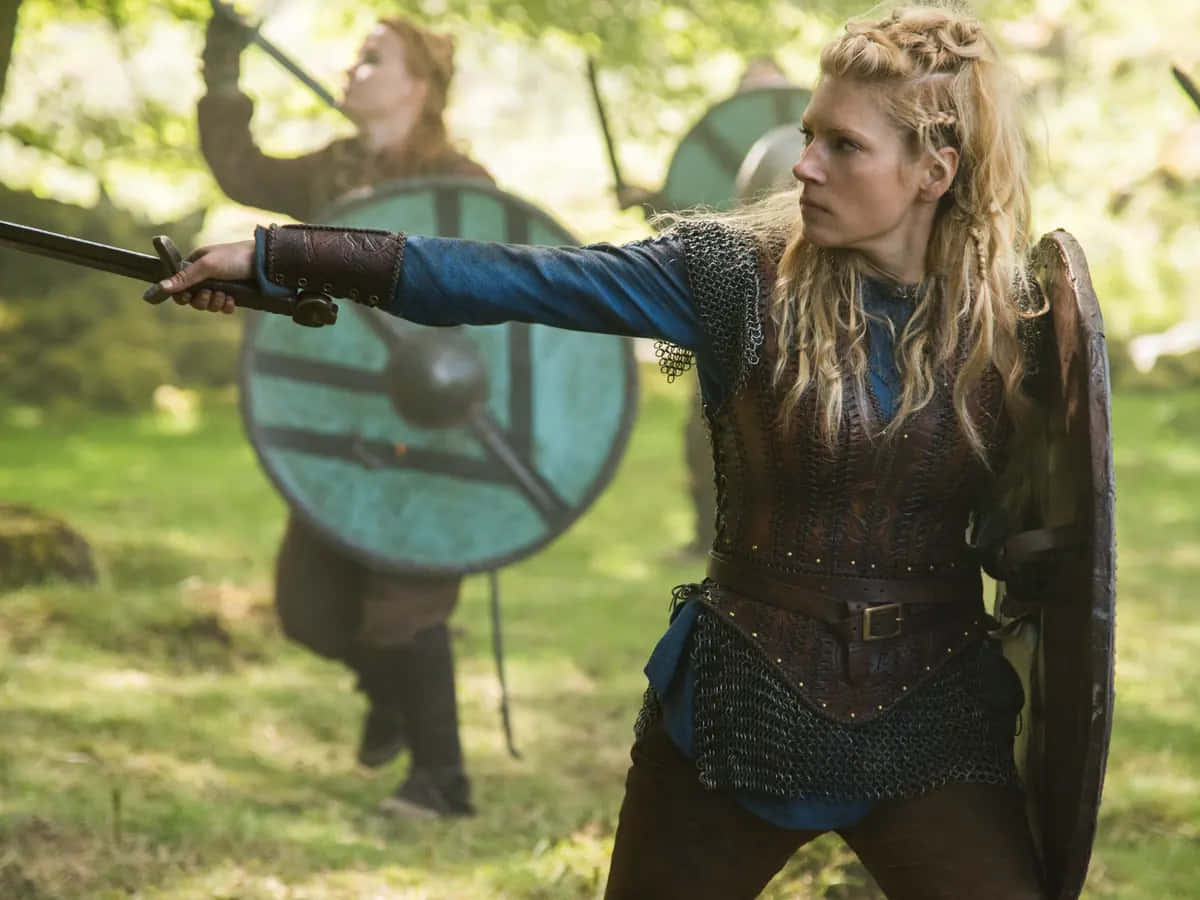 Bold Female Viking Warriors Raising Their Shields in Unity