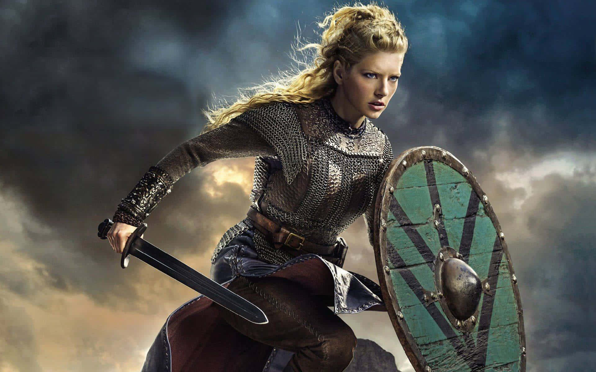 A female Viking Warrior stands ready to defend against enemies.