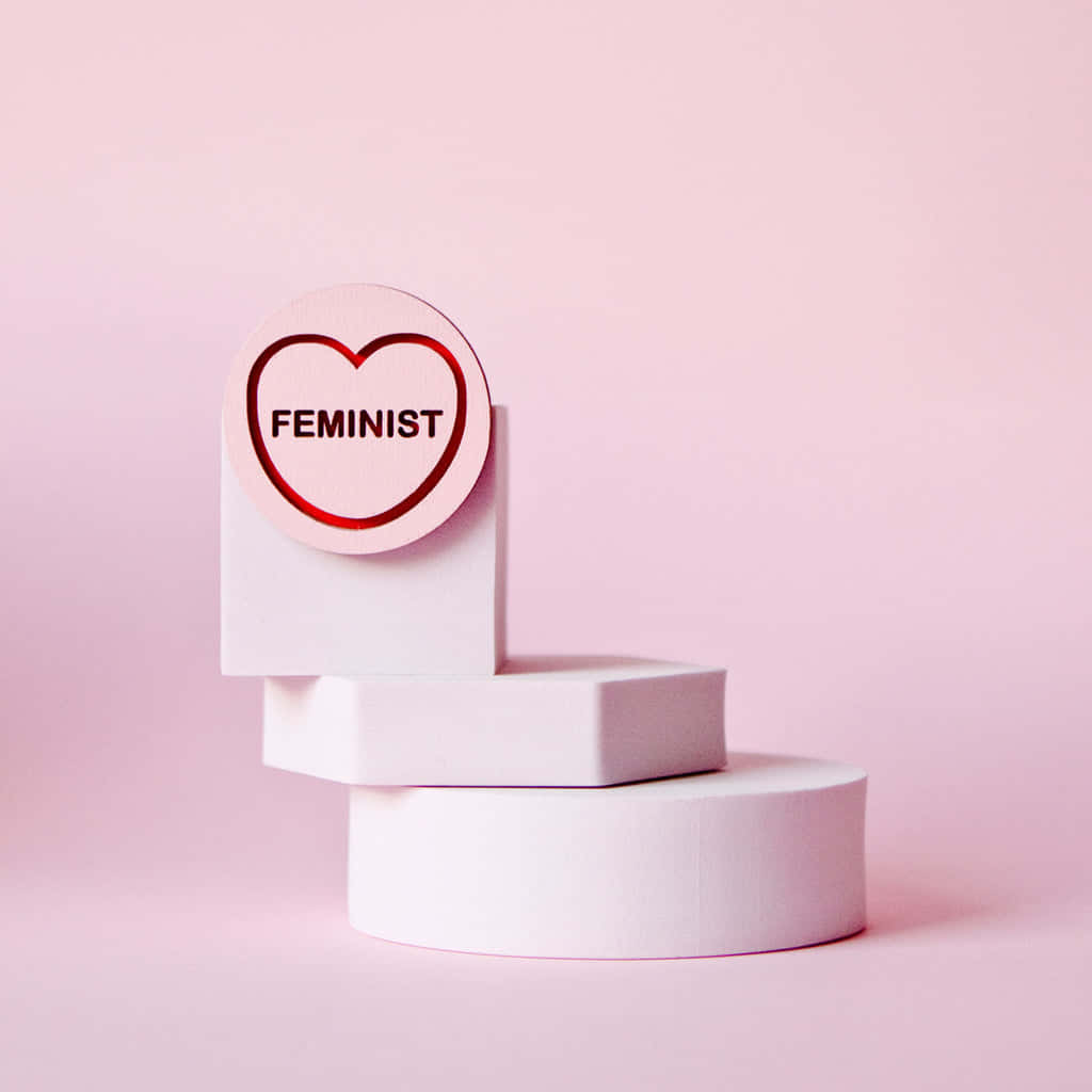 Feminist Heart Buttonon Pedestal Wallpaper