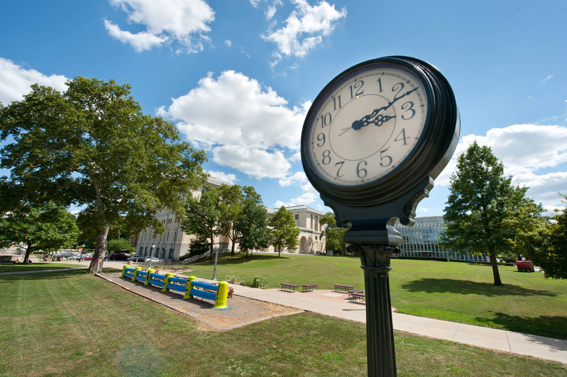 Fence And Clock At Carnegie Mellon University Wallpaper