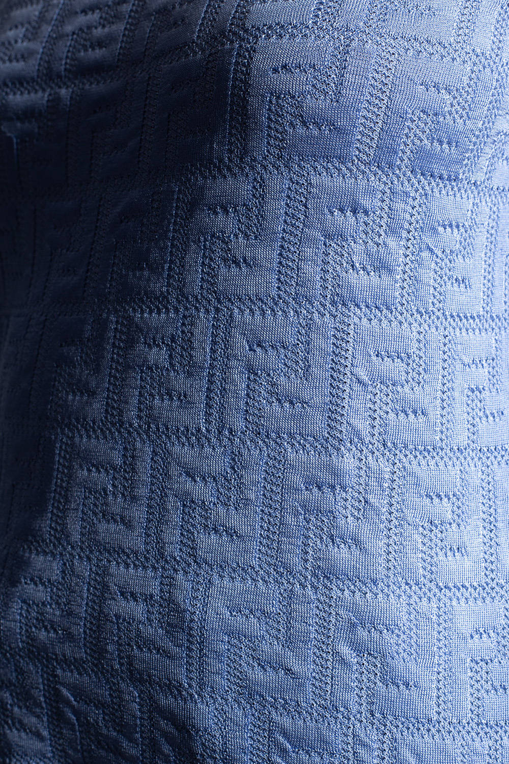 Fendi Designer Logo On Blue Fabric Wallpaper