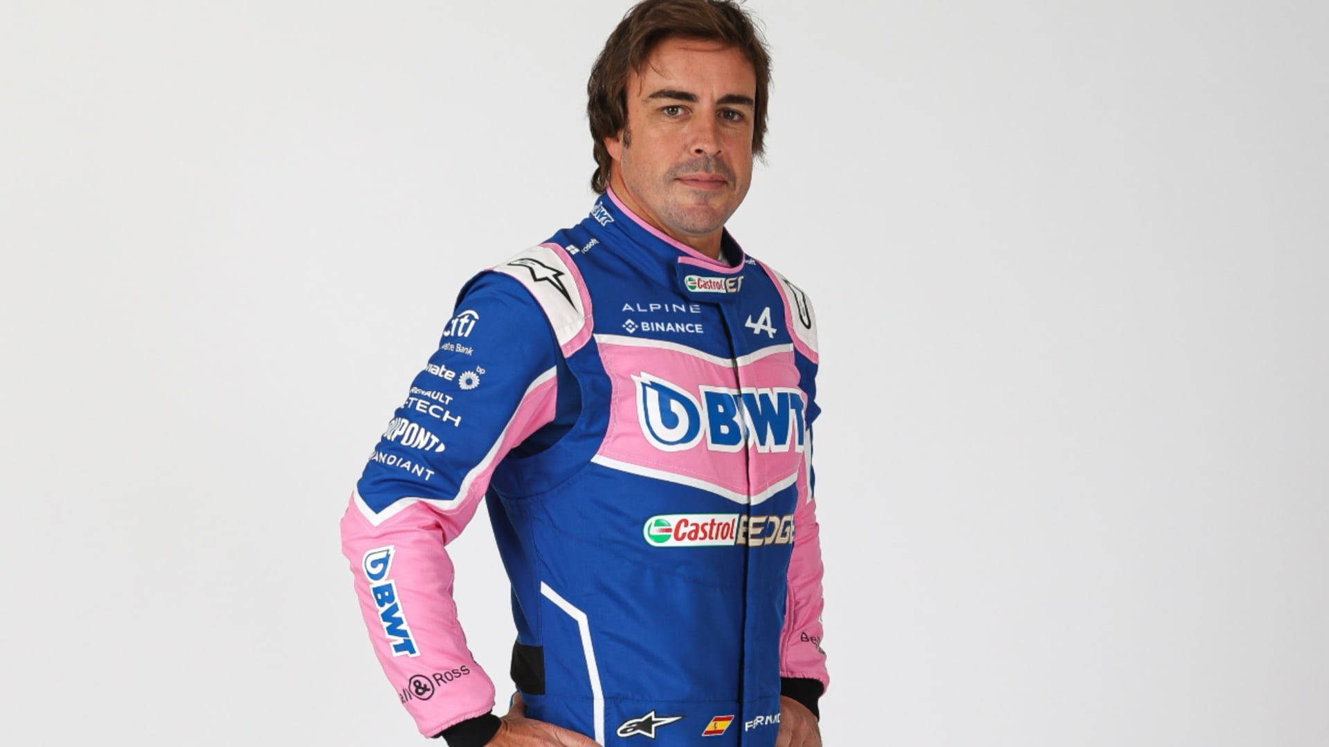 Fernando Alonso Pink And Blue Suit Wallpaper