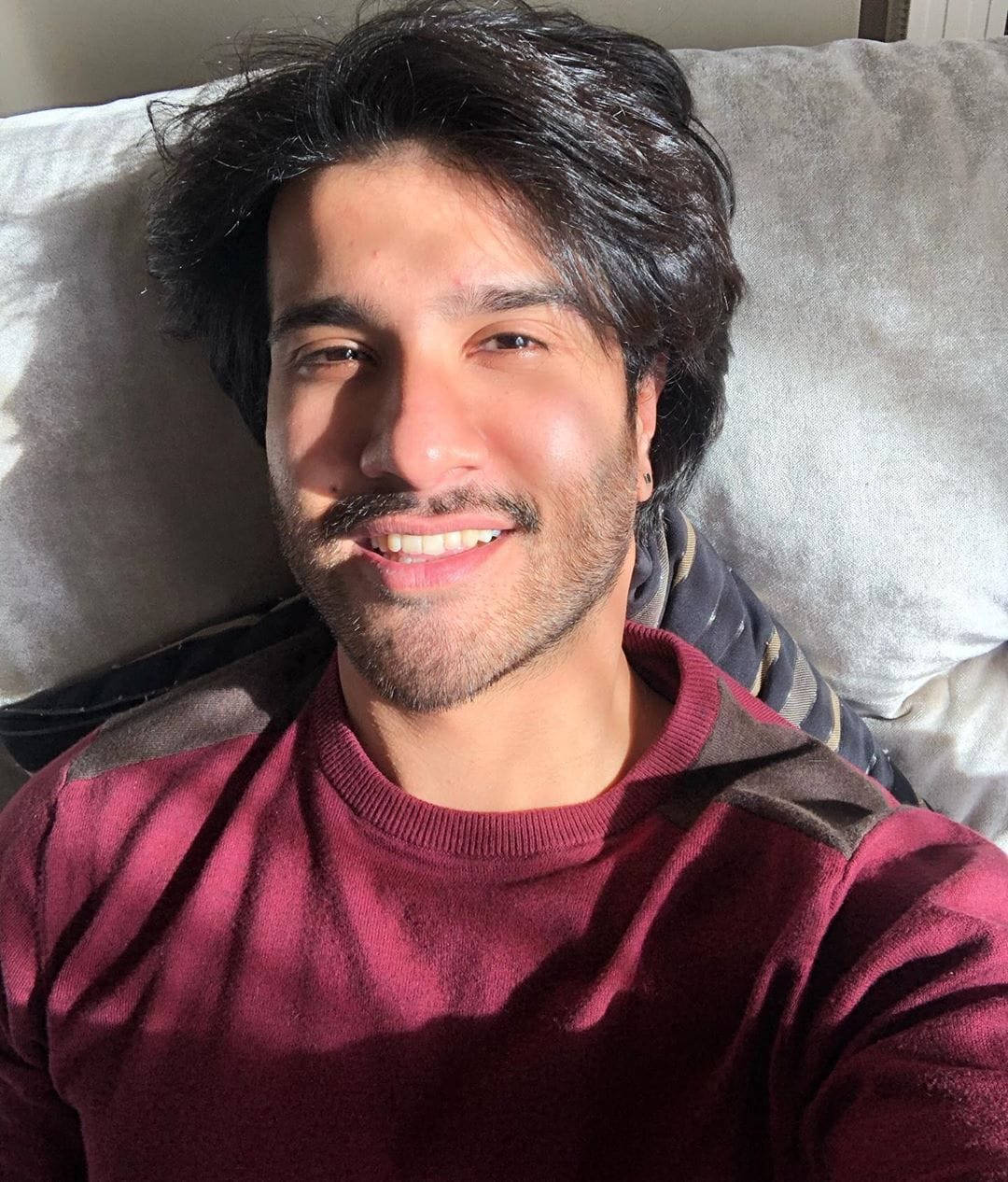 Feroz Khan Laying Down Selfie Wallpaper