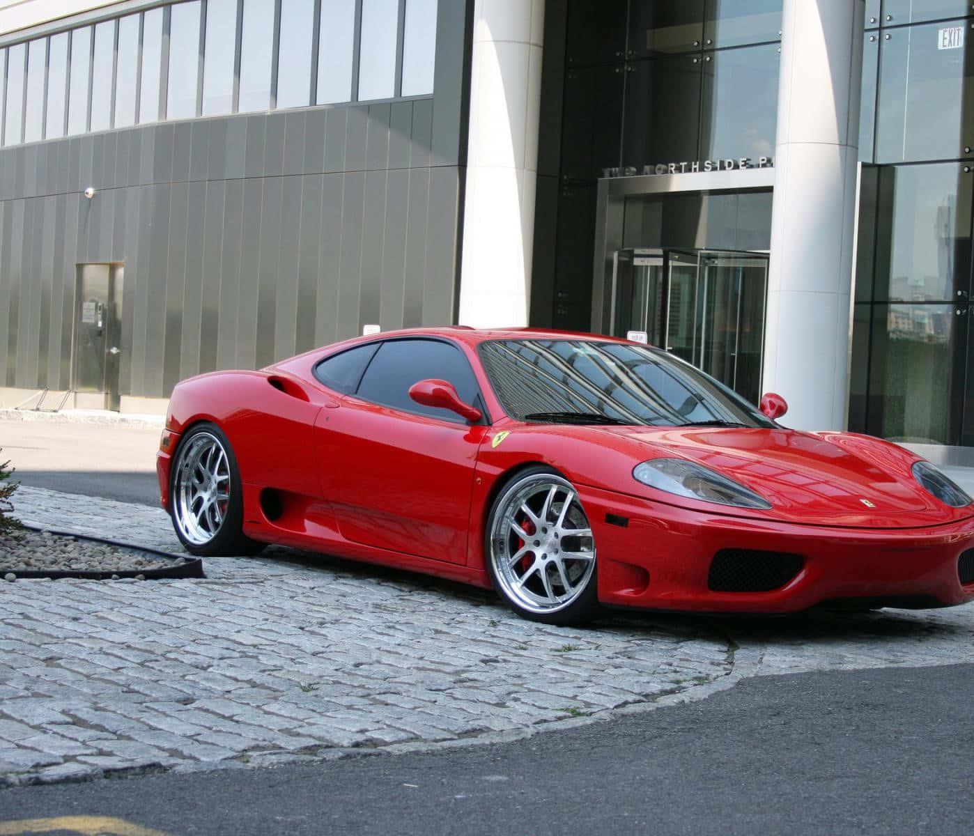 Stunning Red Ferrari 360 Modena, Parked and Ready for Adventure Wallpaper