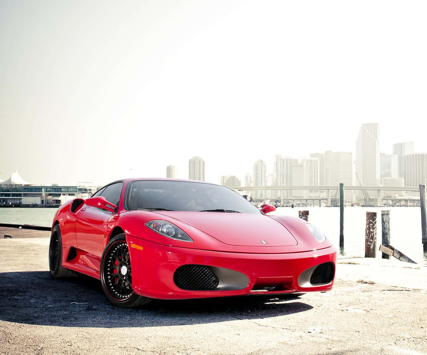 Stunning red Ferrari 360 Modena parked on a picturesque location Wallpaper