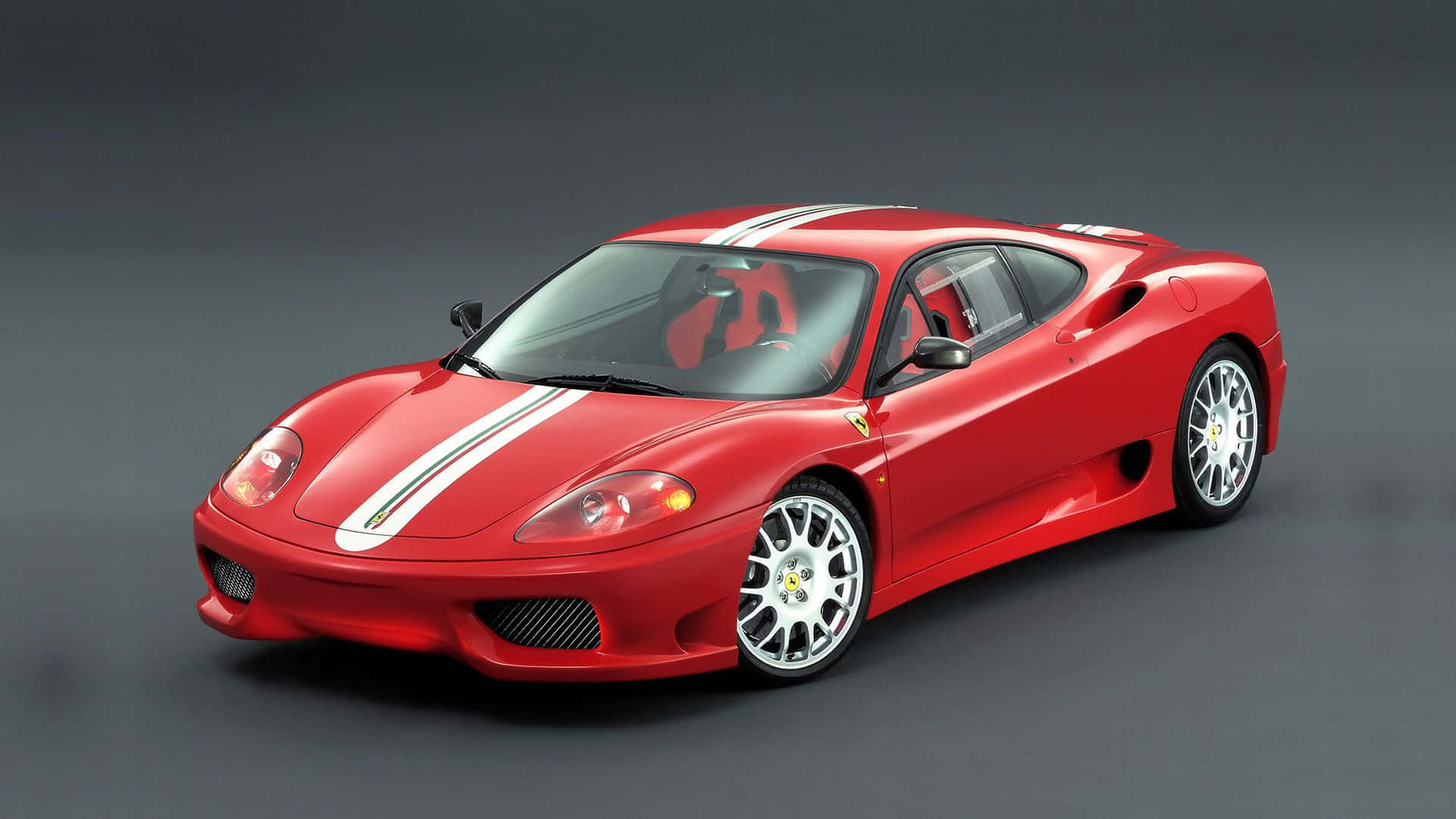 Stunning Red Ferrari 360 Modena in Motion Wallpaper