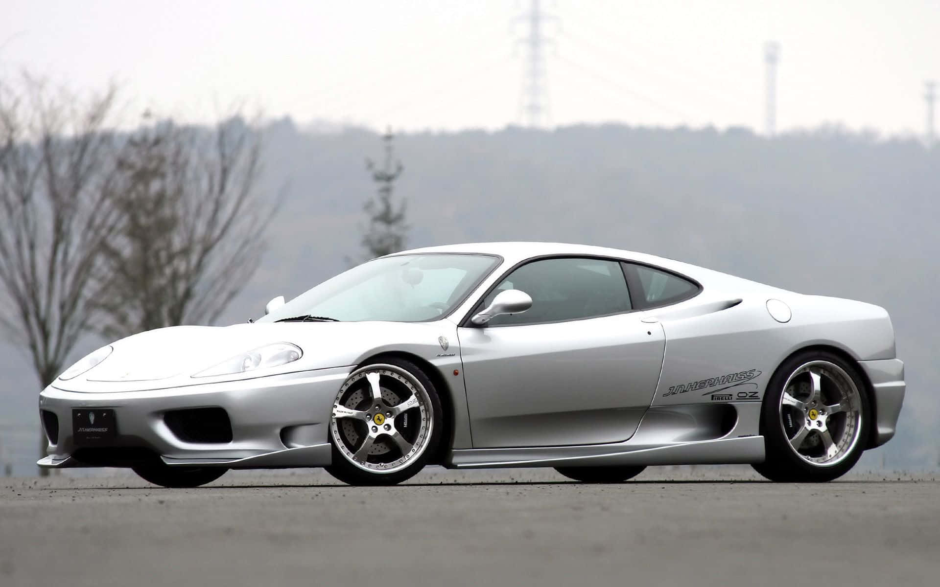 Impresionanteferrari 360 Modena Rojo En La Carretera. Fondo de pantalla