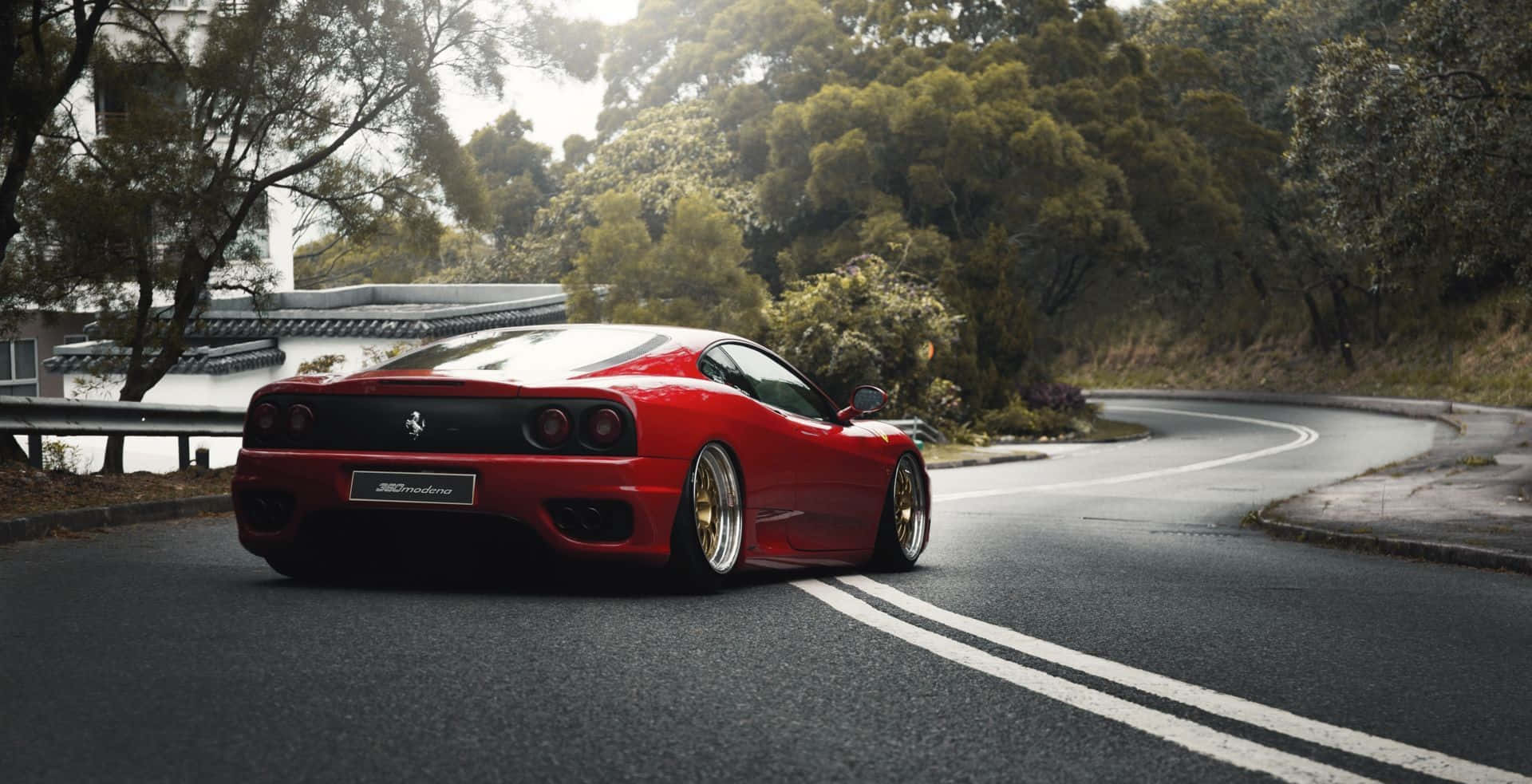 Impresionanteferrari 360 Modena En Movimiento Fondo de pantalla