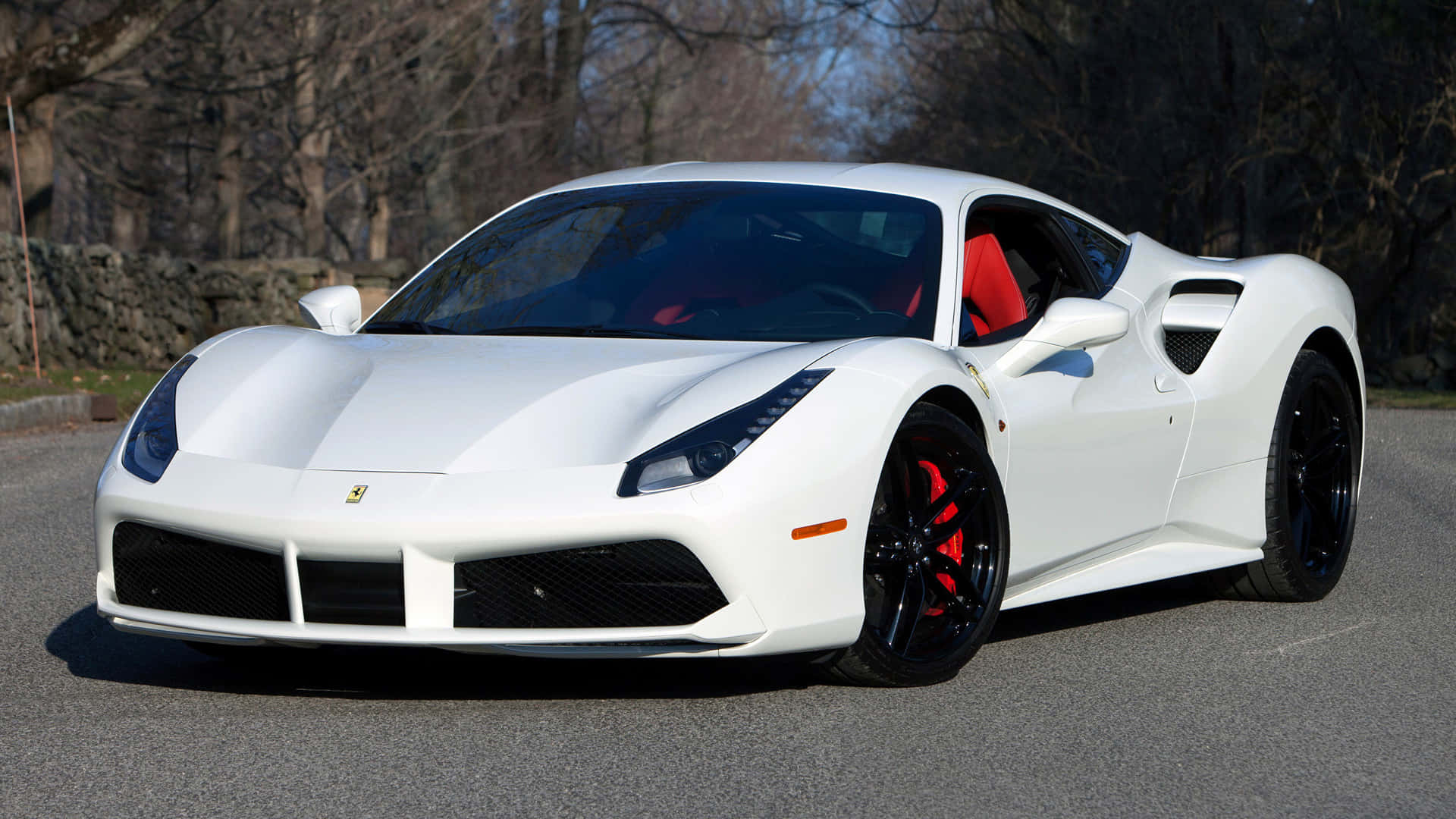 Sleek Red Ferrari 488 Spider on Open Road Wallpaper