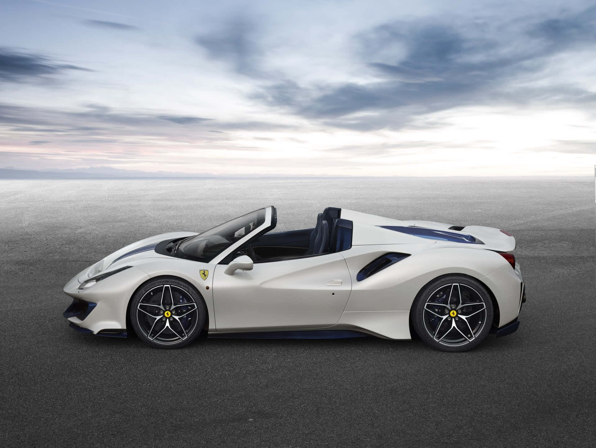 Sleek and Luxurious Ferrari 488 Spider in motion Wallpaper