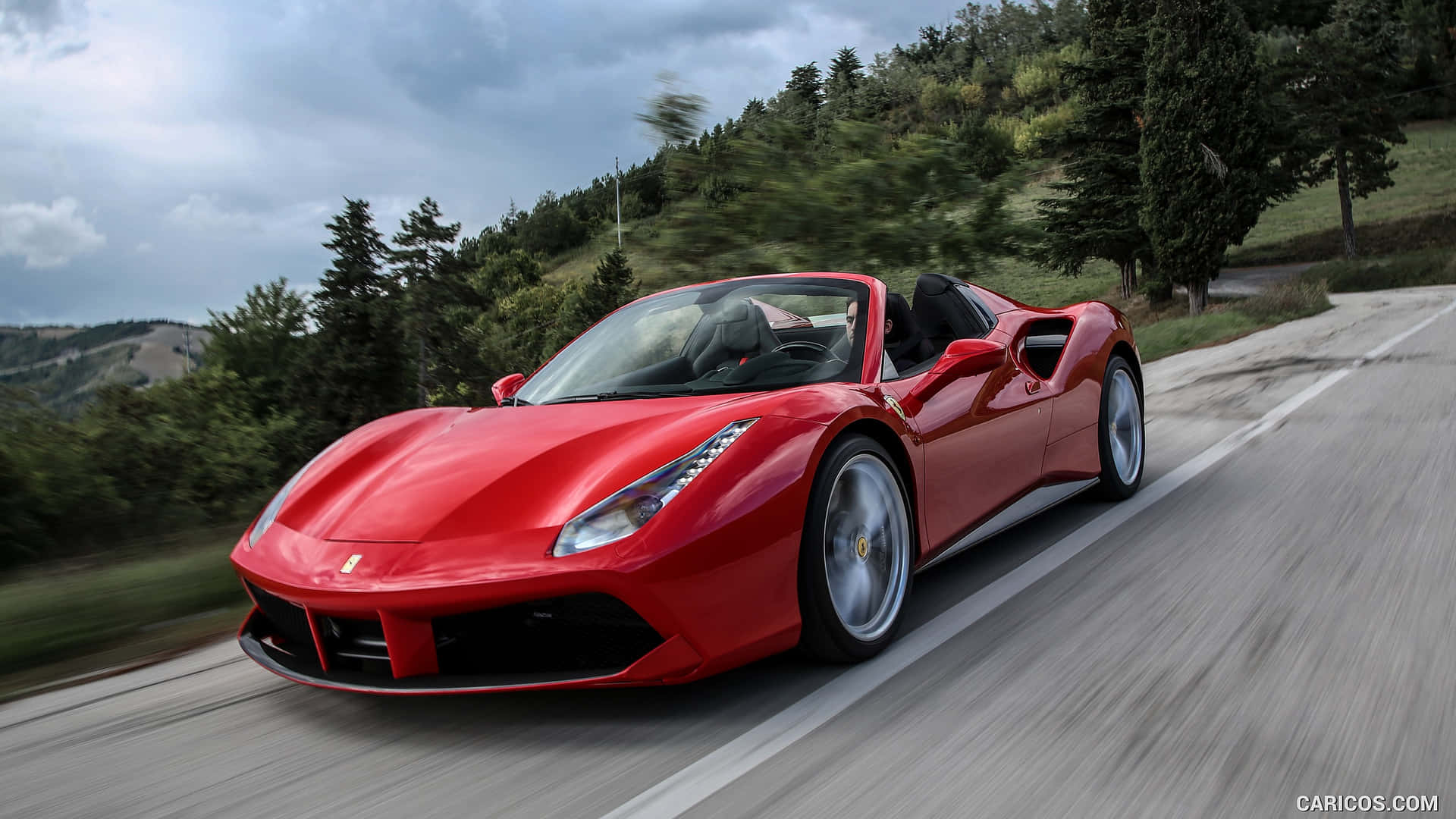 Bijschrift: Slanke Ferrari 488 Spider Ontketent Kracht En Elegantie Achtergrond