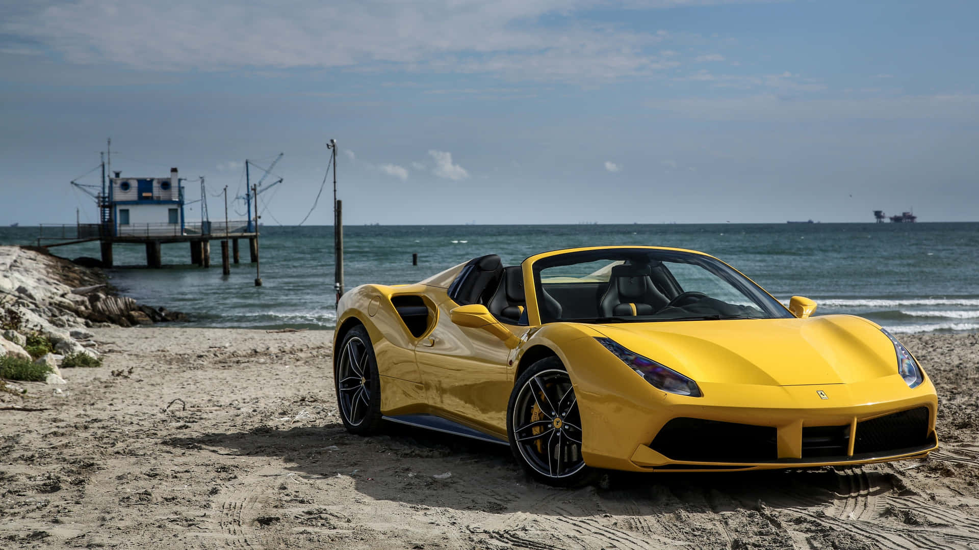 Sleek Red Ferrari 488 Spider Cruising on the Road Wallpaper