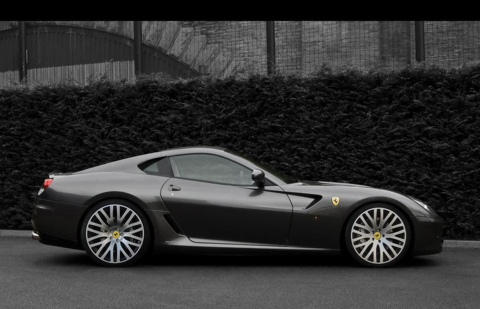 Captivating Ferrari 599 GTB Fiorano in Motion Wallpaper