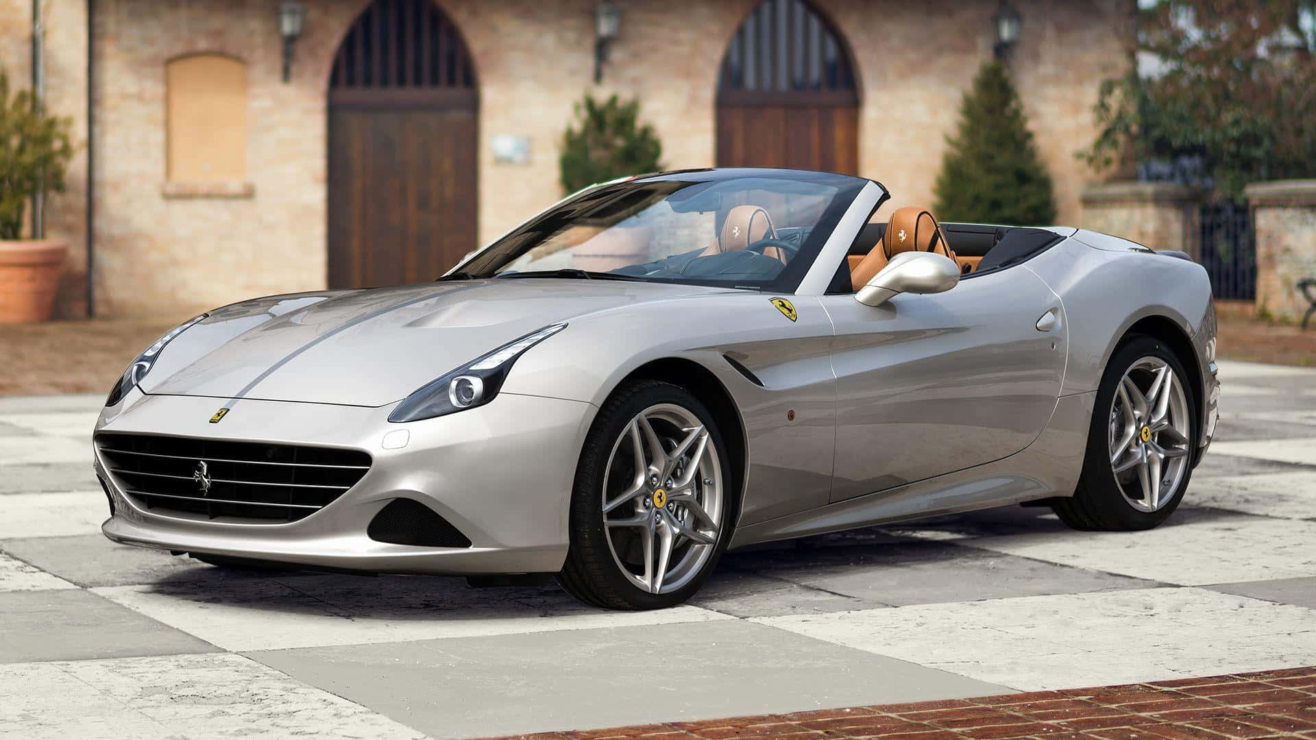 Bildetekst: Fantastisk Rød Ferrari California T Som Cruiser På Åpen Vei Bakgrunnsbildet