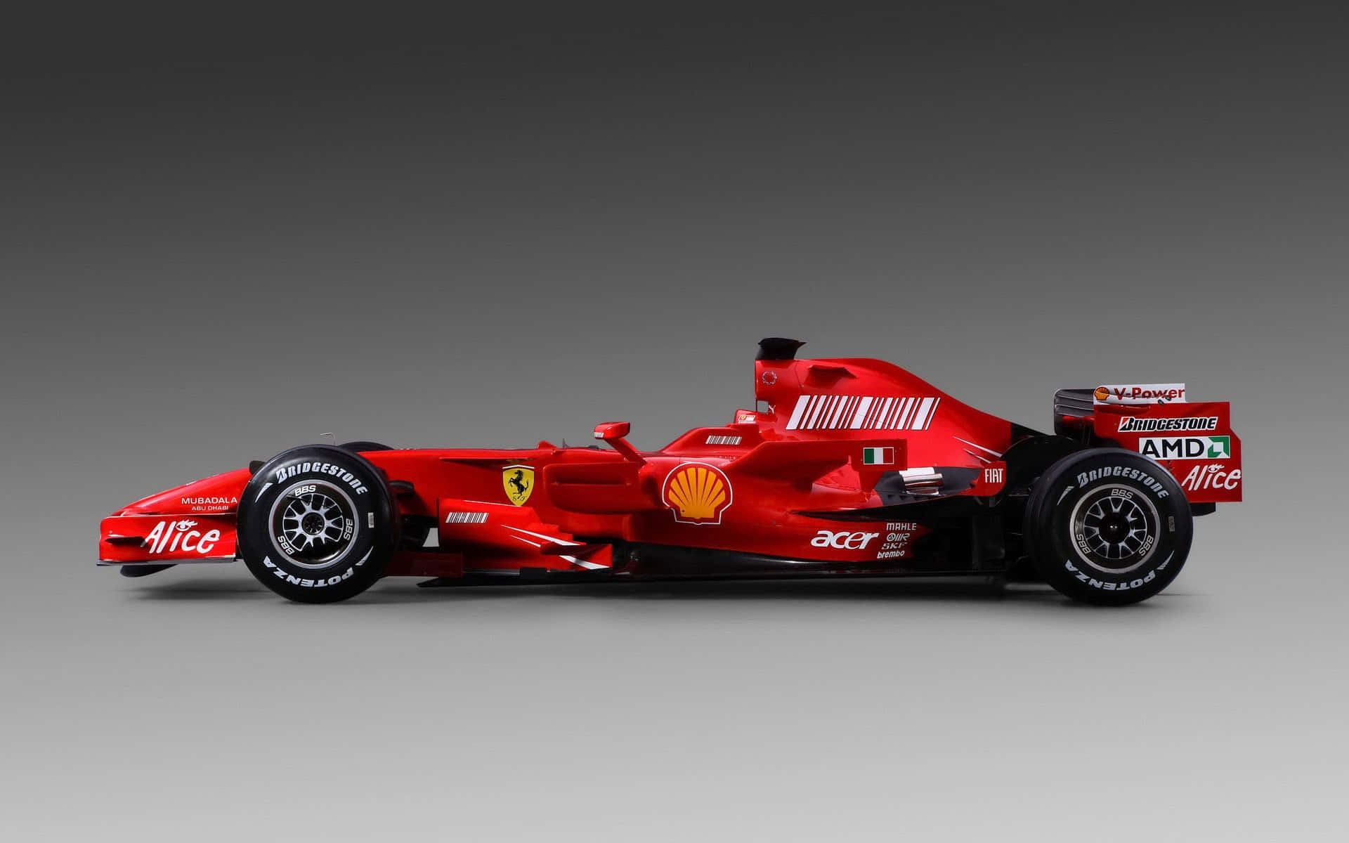 Cochede Fórmula 1 De Ferrari En La Línea De Salida Fondo de pantalla