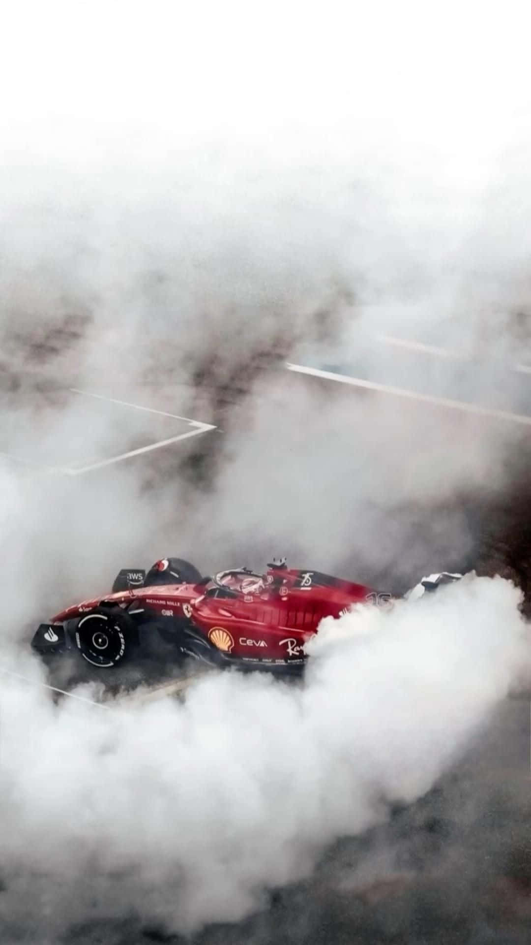 Ferrari F1 Racingin Smoke Wallpaper
