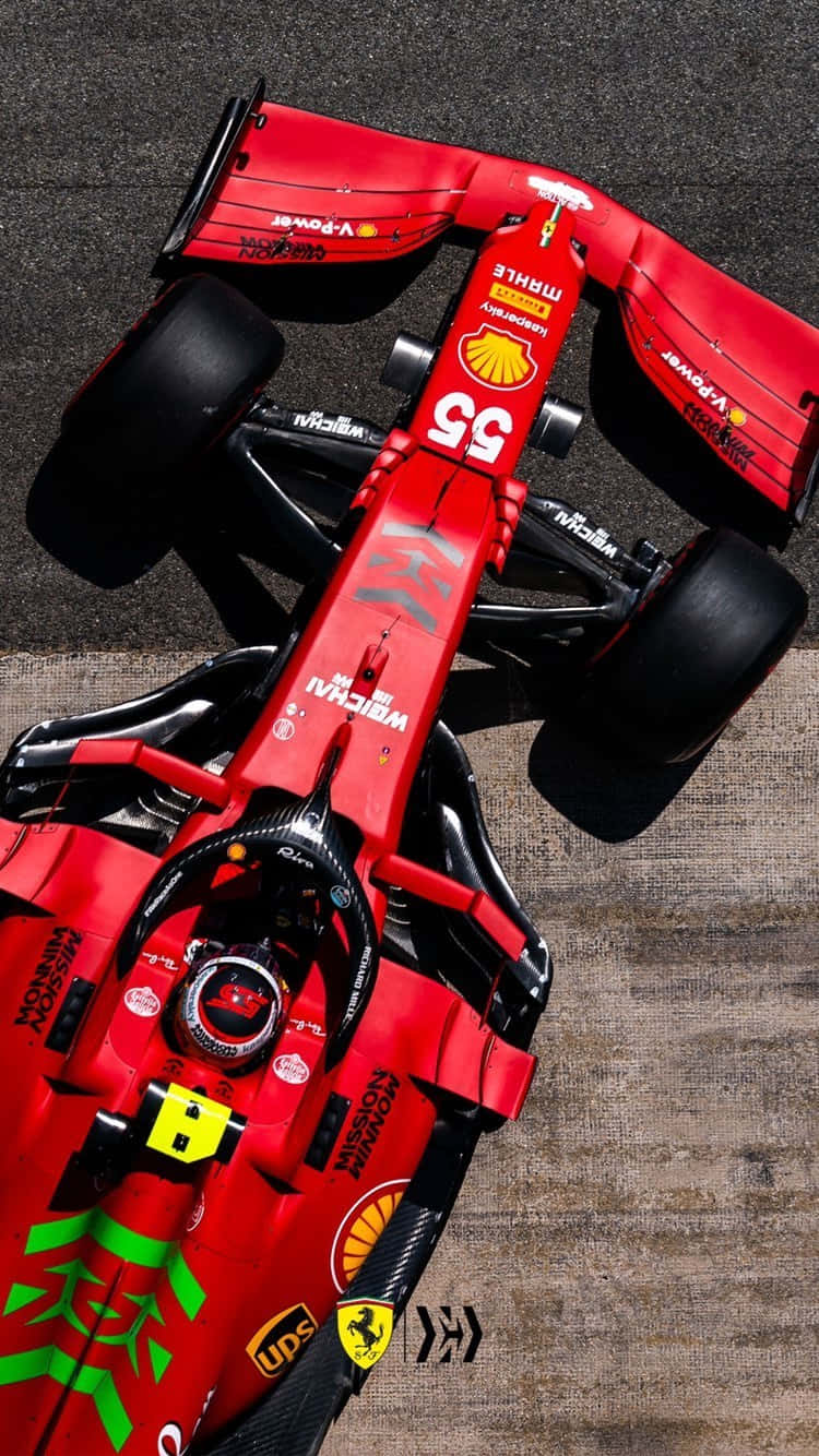 "Speed and Precision: Scuderia Ferrari F1 Car" Wallpaper