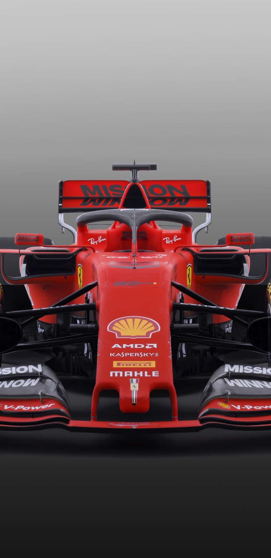 Scuderia Ferrari kører rundt på banen i en F1-bil. Wallpaper