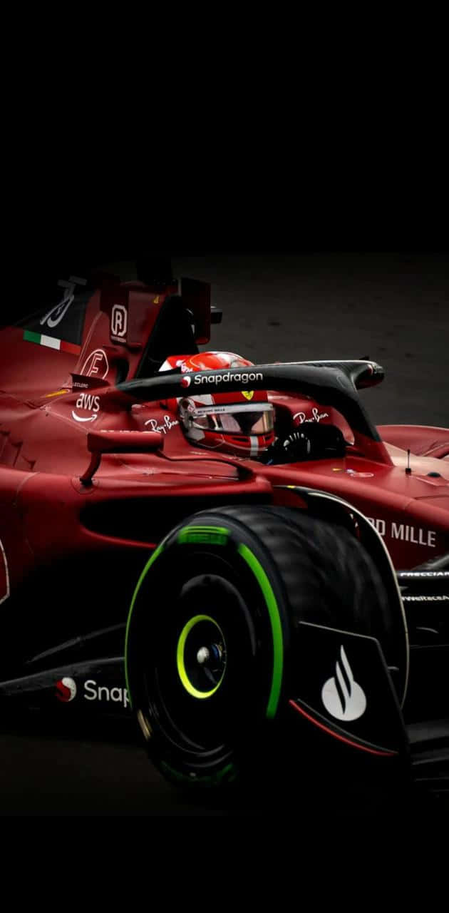 Vettelcorriendo Para Ferrari En F1 Fondo de pantalla