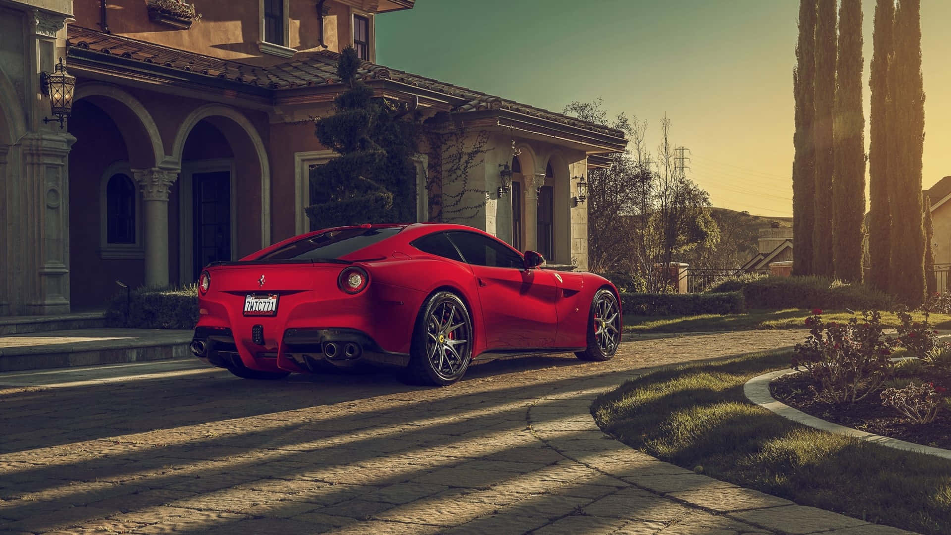Experience the Power and Elegance of the Ferrari F12 Berlinetta Wallpaper