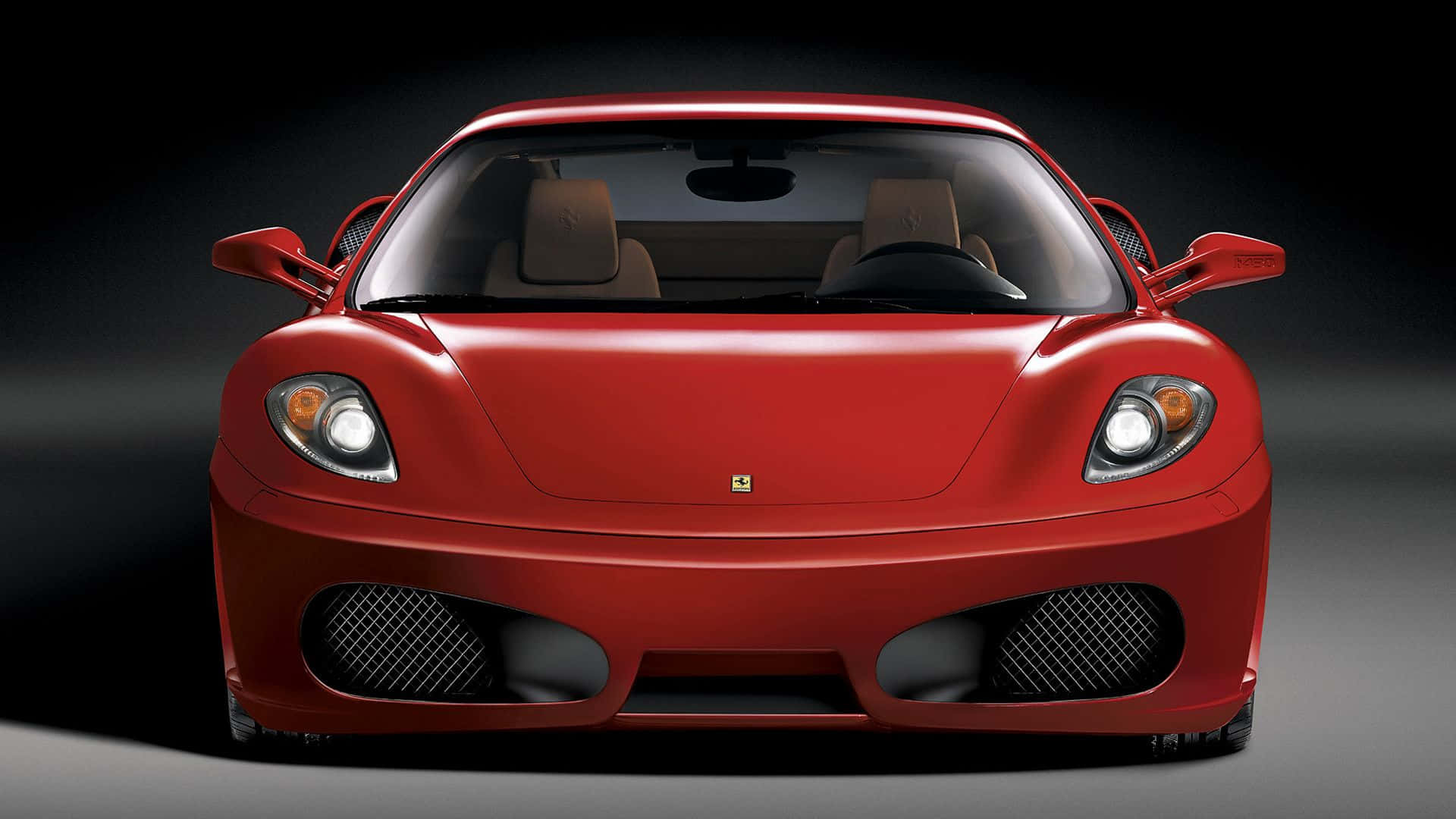 Stunning Red Ferrari F430 on the Road Wallpaper