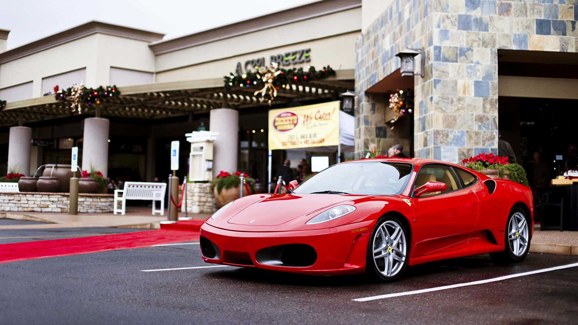 Sleek Red Ferrari F430 on the Road Wallpaper