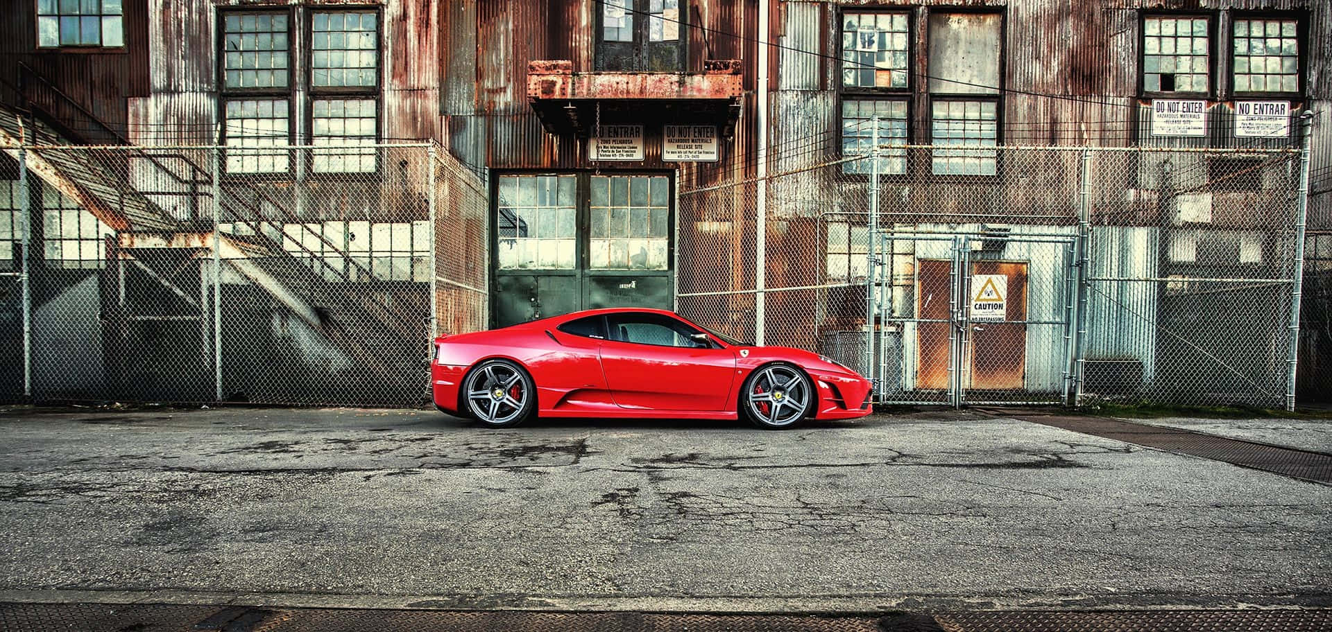 Sleek Red Ferrari F430 in Action Wallpaper