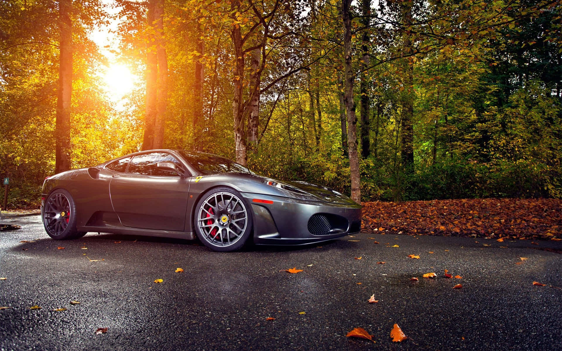 Impresionanteferrari F430 Rojo En Un Hermoso Camino Escénico Fondo de pantalla