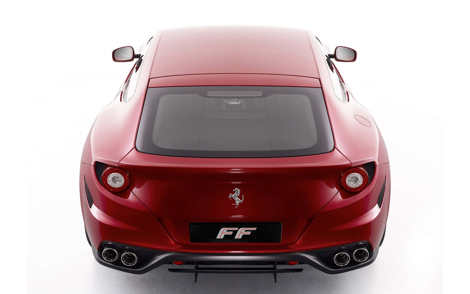 Sleek Ferrari FF on a Scenic Road Wallpaper