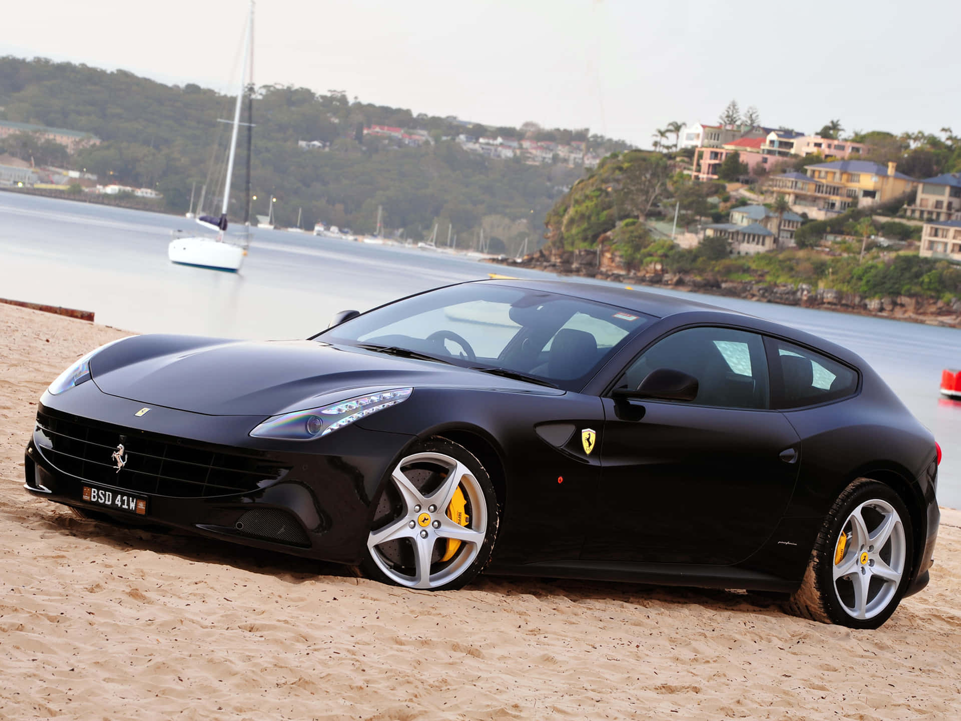 Captivating red Ferrari FF with excellent design and innovation Wallpaper