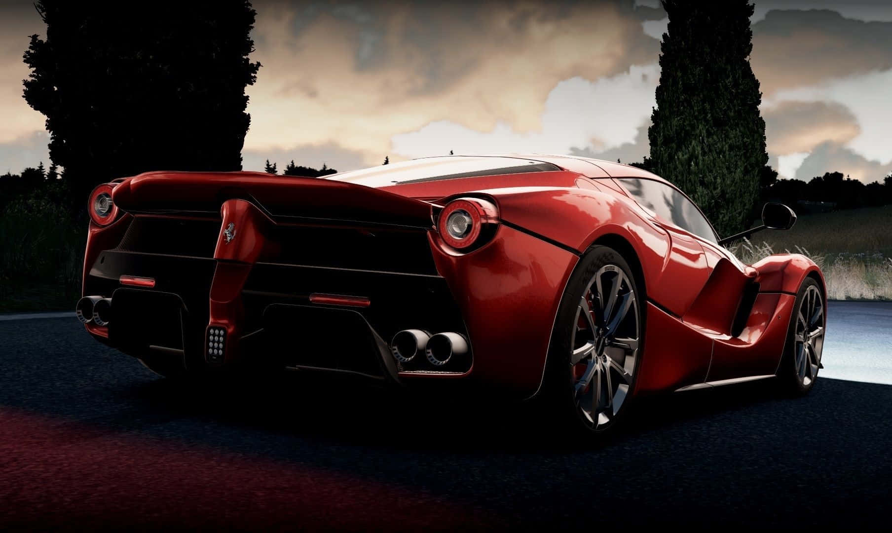 Download Caption: Stunning red Ferrari LaFerrari on the open road Wallpaper  | Wallpapers.com