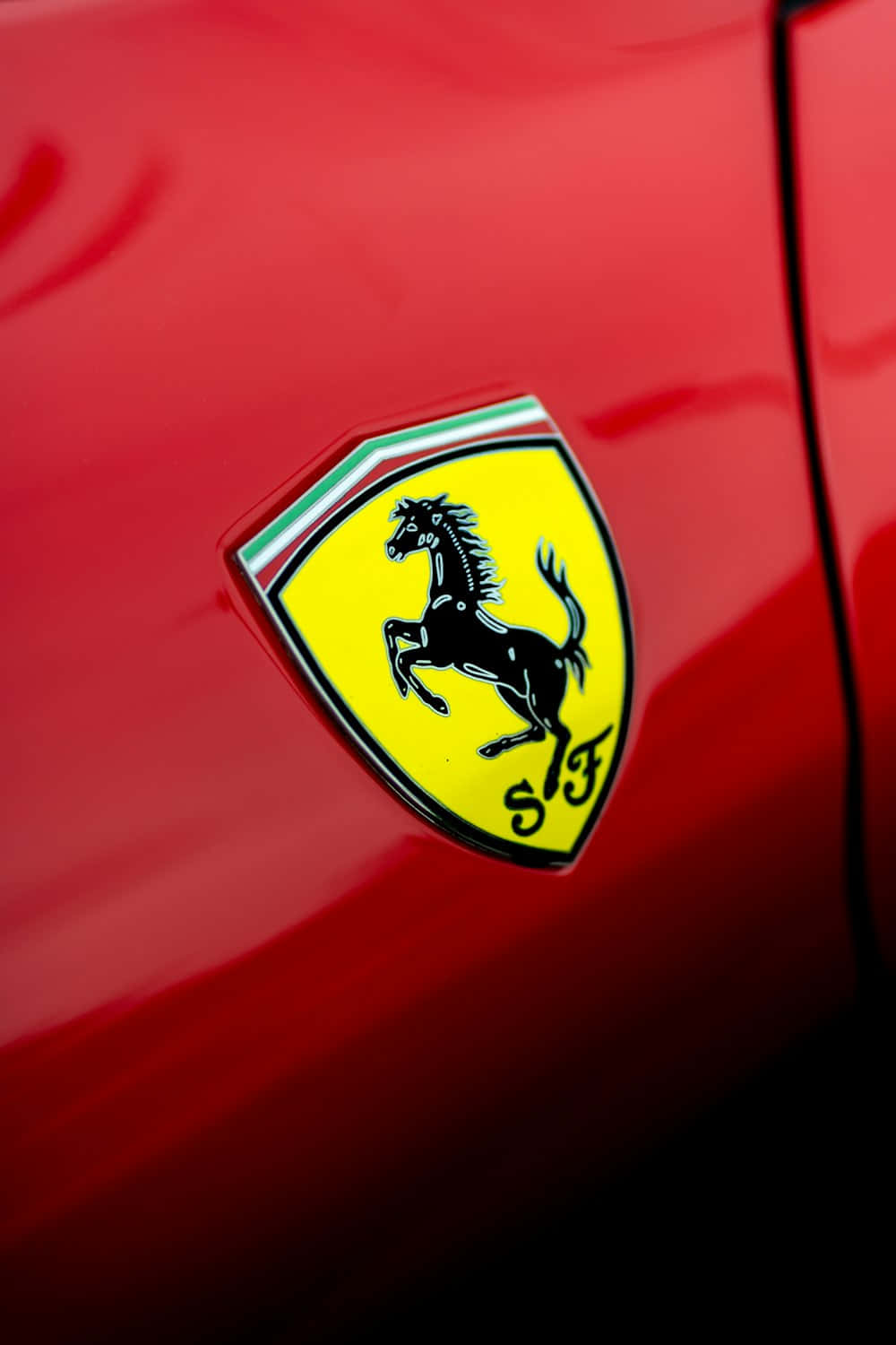 Ferrari Logo Closeup Red Background Wallpaper