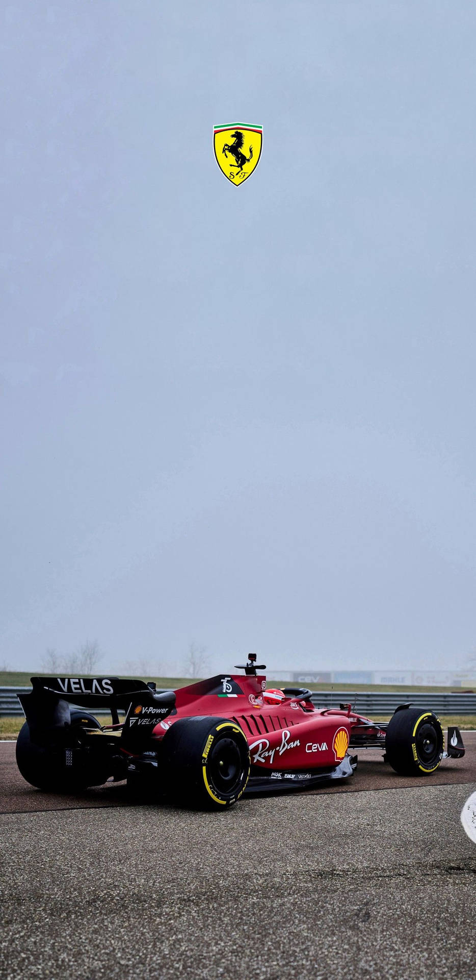 Download 2022 F1 75 Ferrari Phone With Logo Wallpaper | Wallpapers.Com