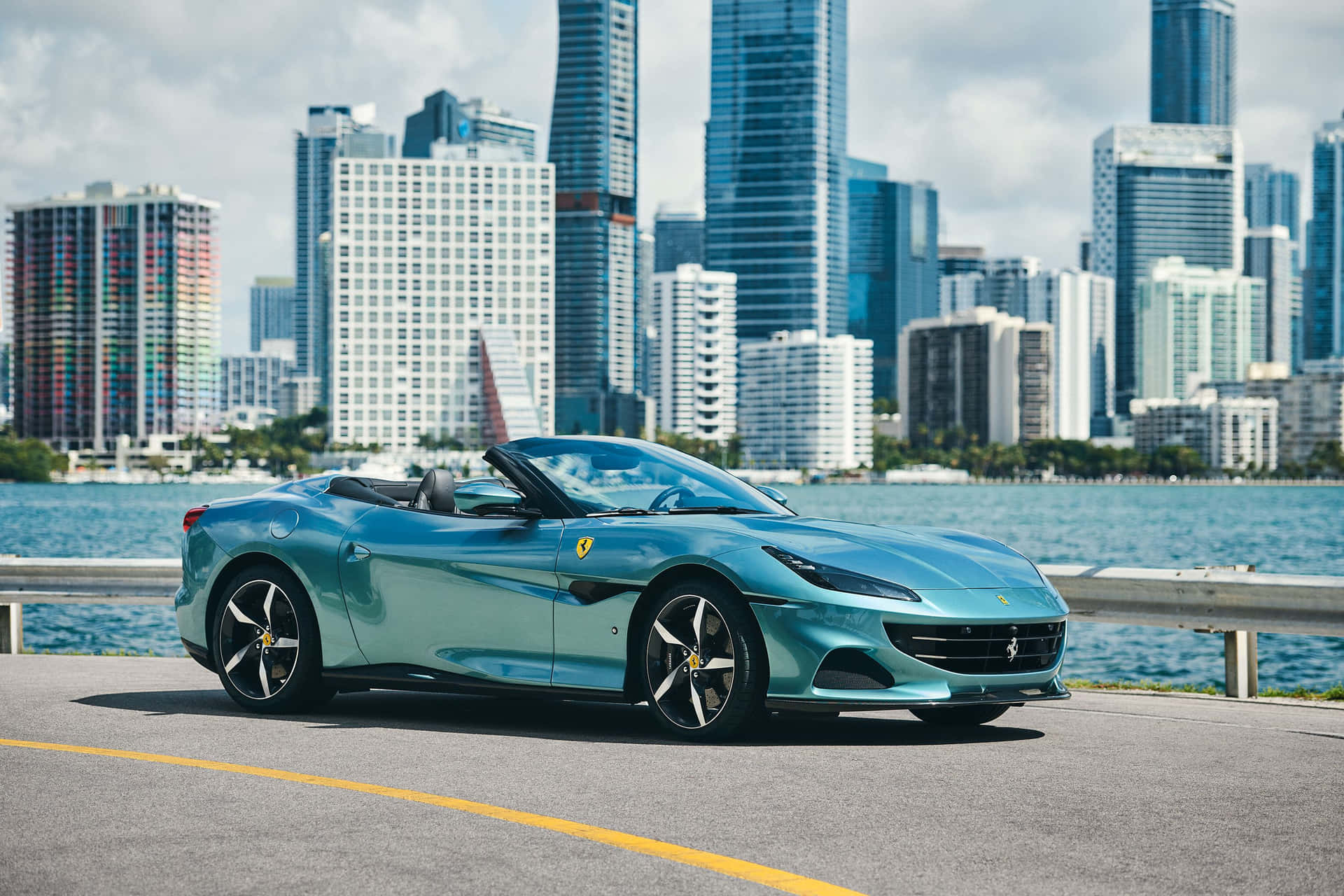 The luxurious Ferrari Portofino amidst breathtaking scenery Wallpaper