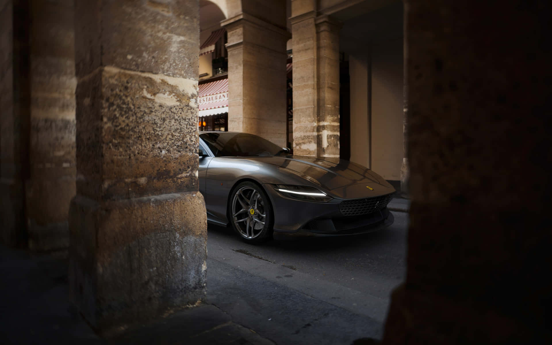 Stunning Red Ferrari Roma gliding on the open highway Wallpaper