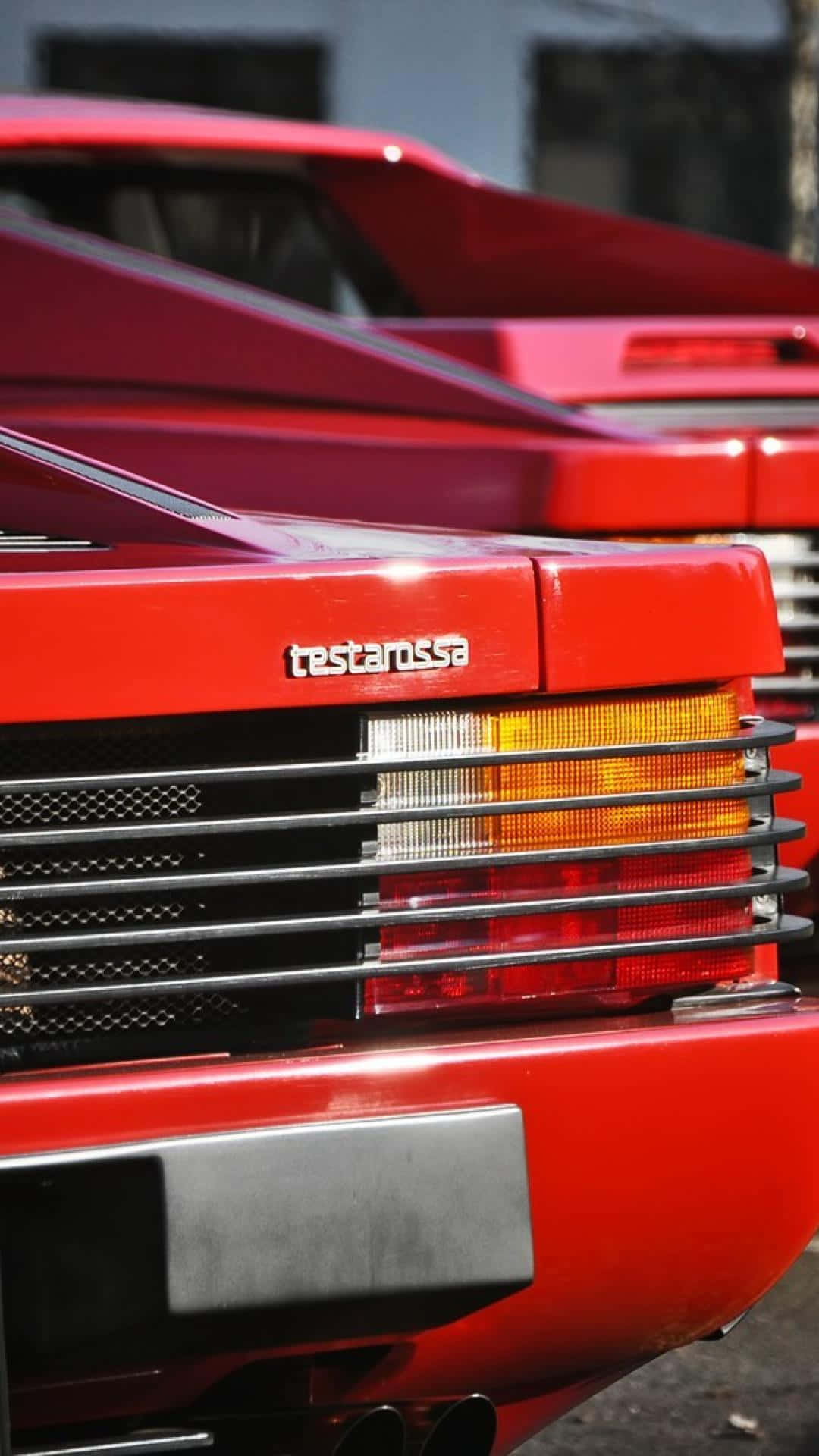 Classic Red Ferrari Testarossa Side View Wallpaper
