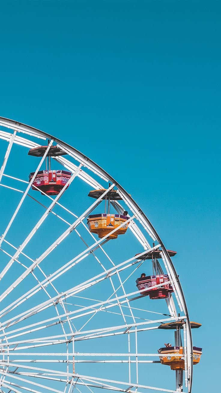 Ferris Wheel Against Blue Sky.jpg Wallpaper