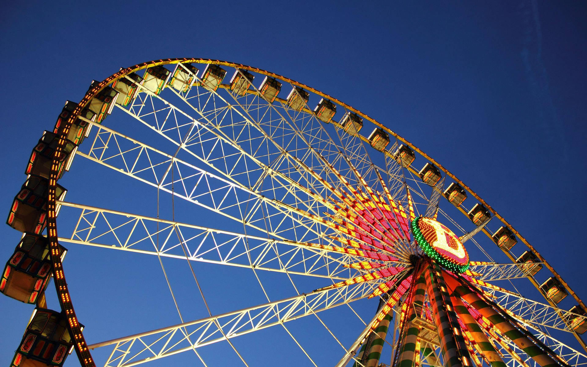 Ferris Wheel At Theme Park Wallpaper