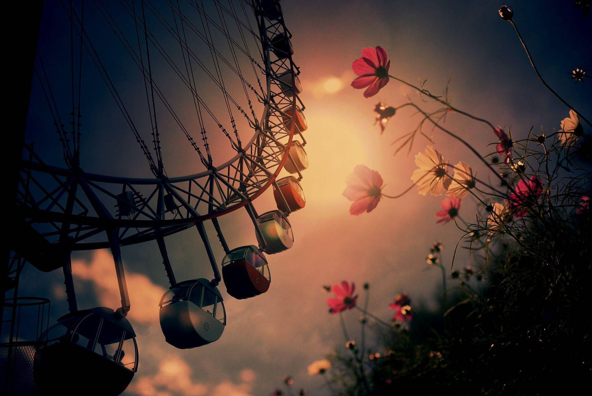 Caption: Majestic Ferris Wheel Adorned With Vibrant Flowers Wallpaper