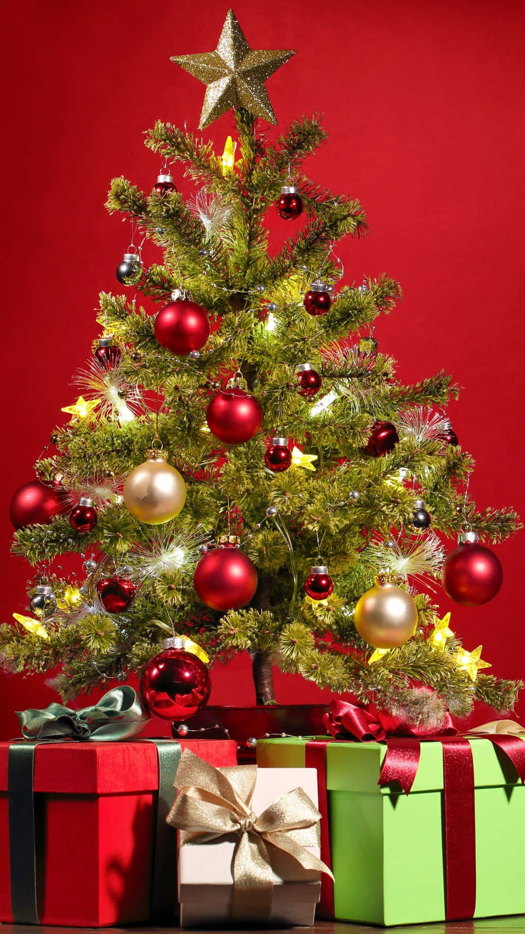 Festive Christmas Tree With Gifts.jpg Wallpaper