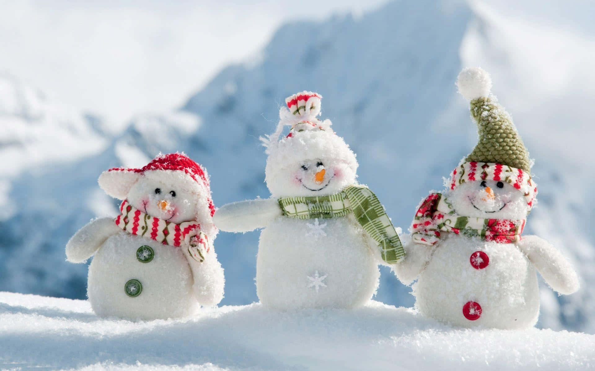 Festive Snowmen Trio Mountain Backdrop.jpg Wallpaper
