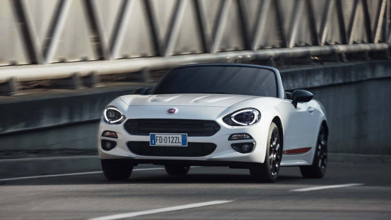 Fiat 124 Spider: The Ultimate Roadster Experience Wallpaper