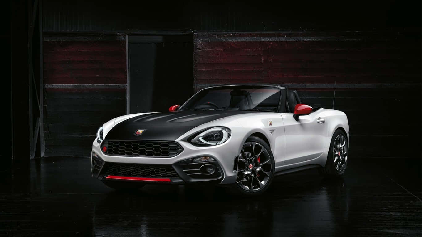Cruising in Style: The Fiat 124 Spider Convertible Wallpaper