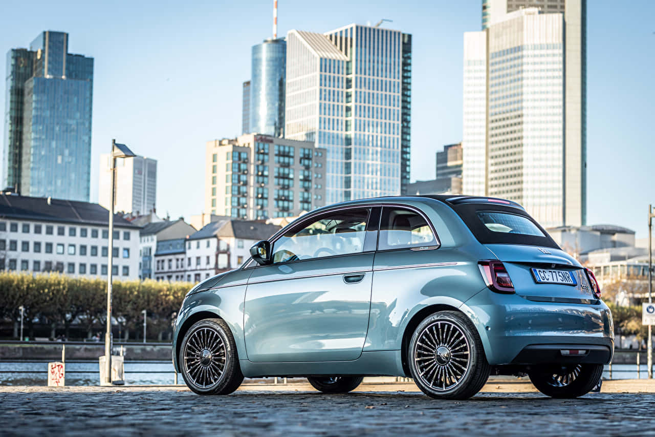Fiat 500 in the City: A Perfect Urban Companion Wallpaper