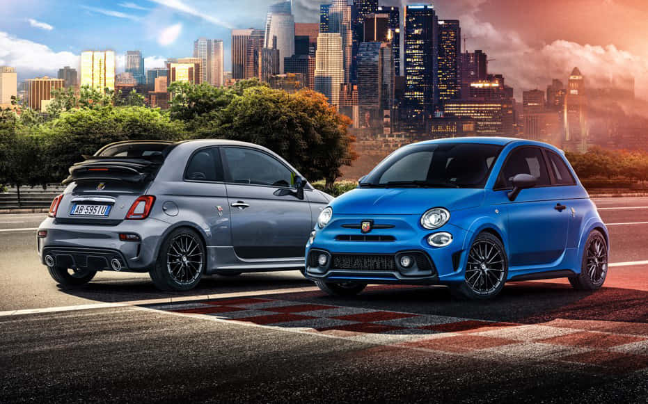 Sleek Red Fiat 500 on an Open Road Wallpaper