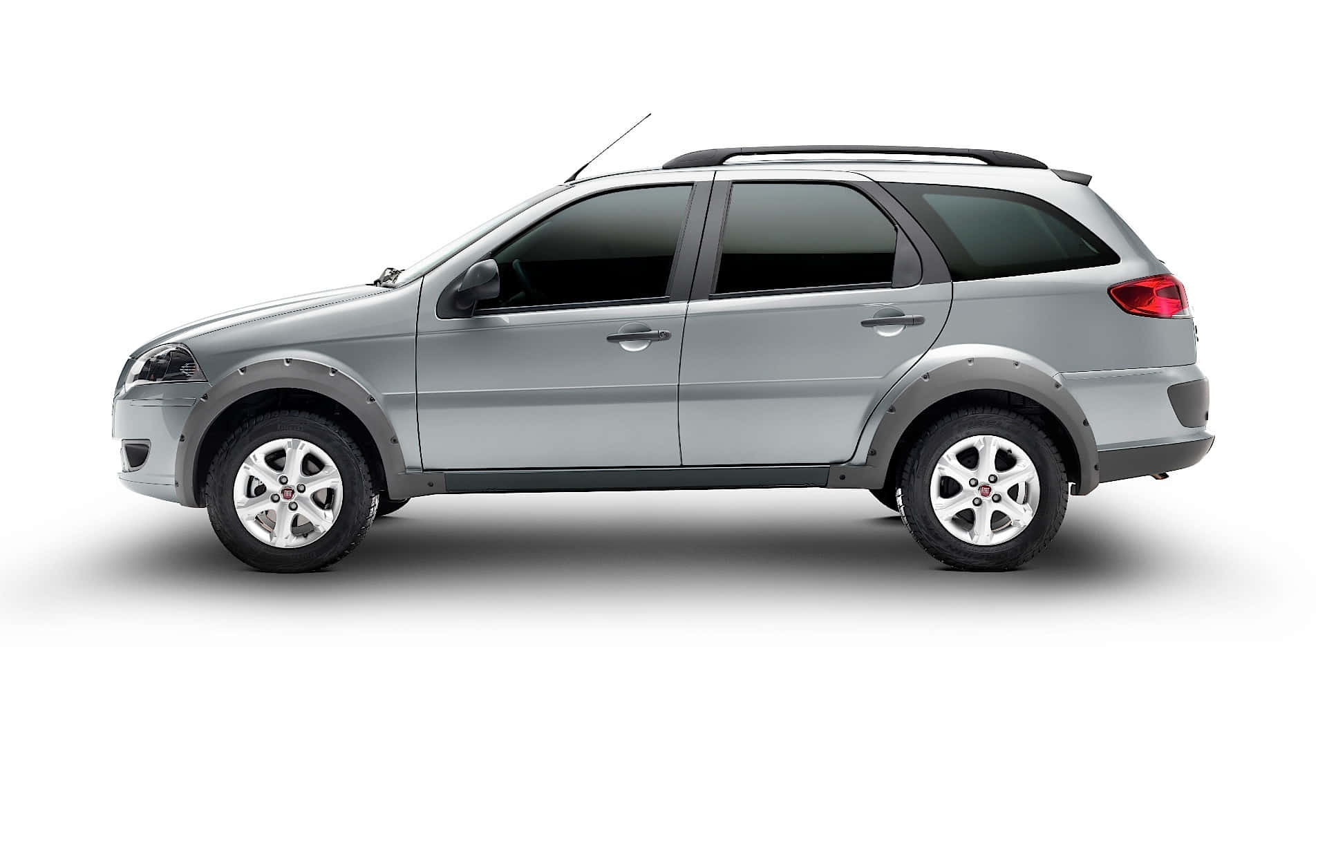 Sleek and Stylish Fiat Palio on the Road Wallpaper