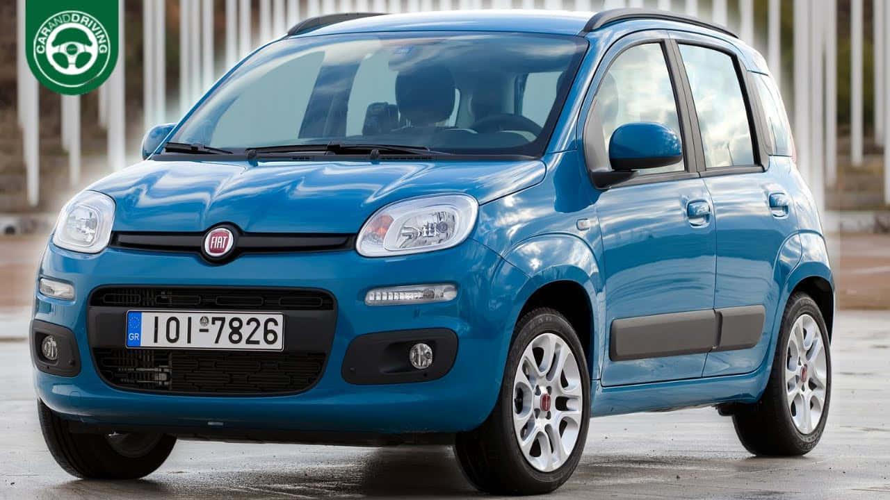 Sleek and Compact Fiat Panda on the Road Wallpaper