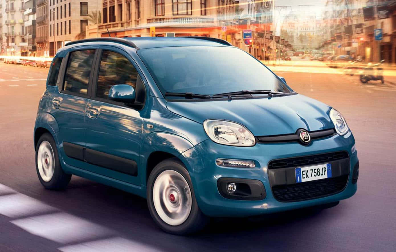 Fiat Panda driving on a road during daytime Wallpaper